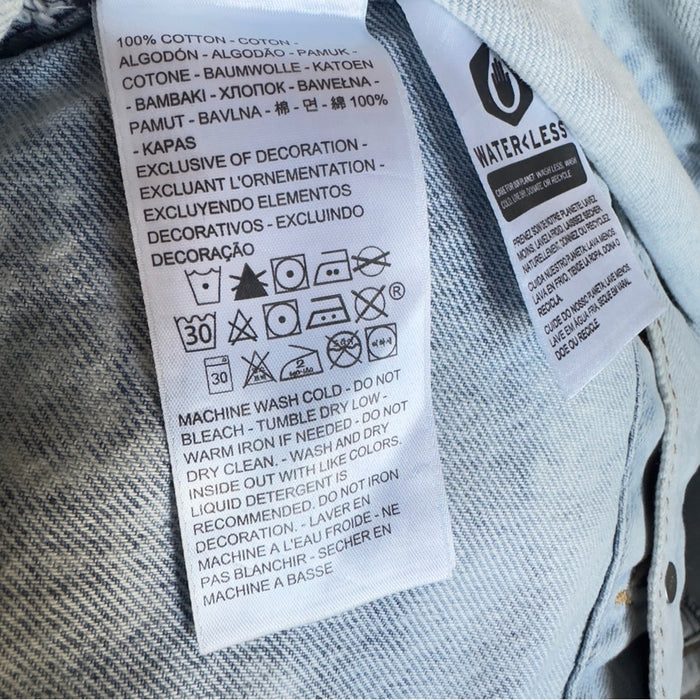 PanacheProse Levi’s Ex-Boyfriend Trucker Denim Jacket Size L with Floral Embroidered Back.L