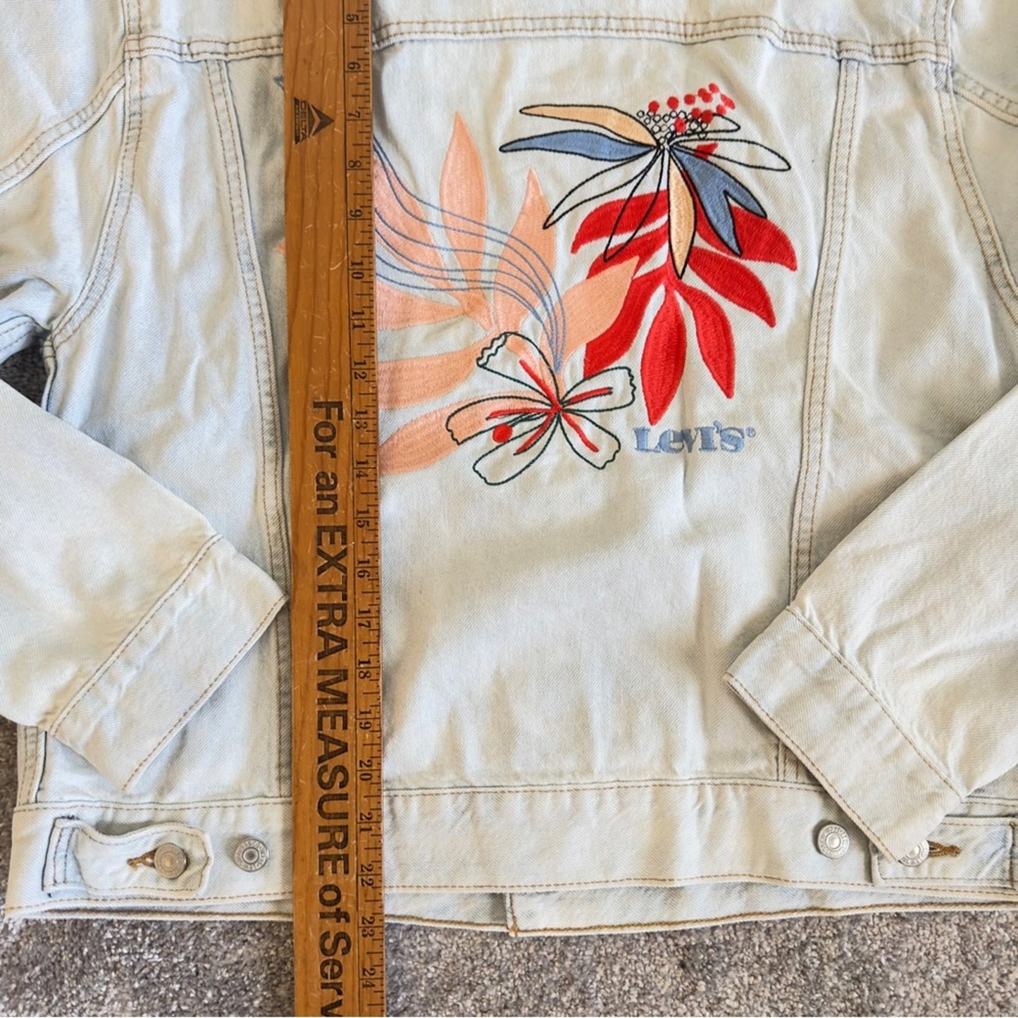 Levi’s Ex-Boyfriend Trucker Denim Jacket Size L with Floral Embroidered Back.L