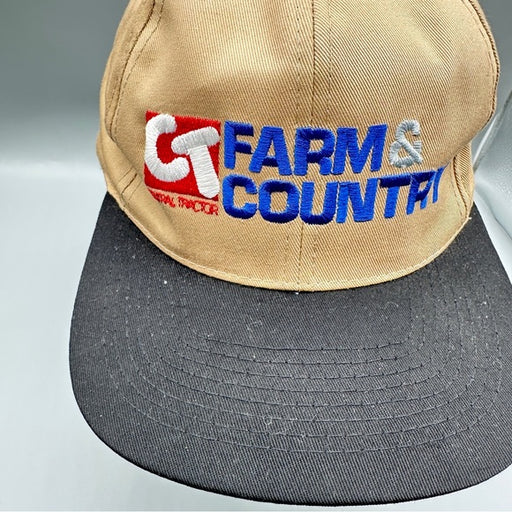 Central Tractor Vintage “Farm & Country” Snapback Hat – Tan & Black From PanacheProse