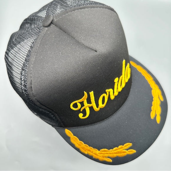 T.I. Vintage Florida Black Trucker Hat – Gold Embroidered Snapback from PanacheProse