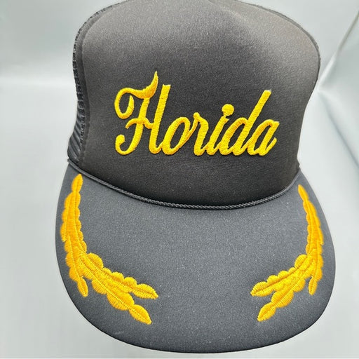T.I. Vintage Florida Black Trucker Hat – Gold Embroidered Snapback from PanacheProse