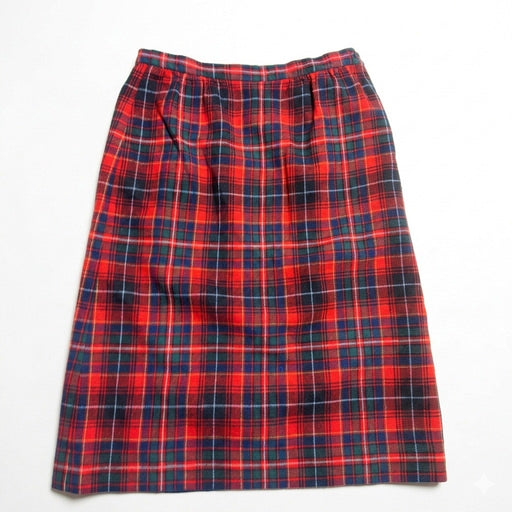 a red, green, and navy plaid vintage high-waisted midi skirt on a white background.